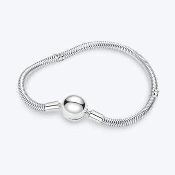 Berlockarmband i sterling silver. Rund lås