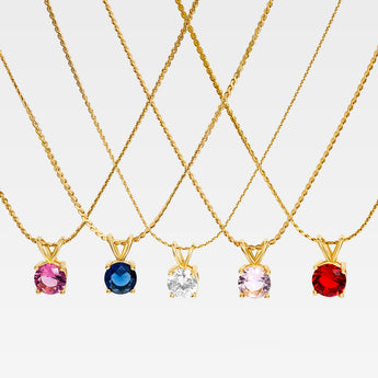 Guldpläterat halsband i rostfritt stål med rund birthstone-berlock (6x10 mm) på 45 cm kedja.