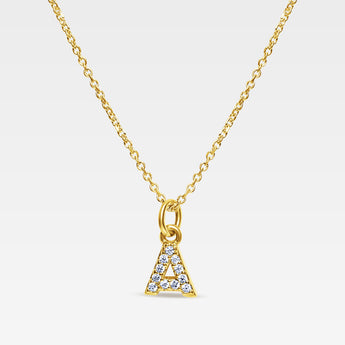Bokstavshalsband i 18k guldplätering och glitter. bokstav och kedja tillverkad av 925 Sterling silver