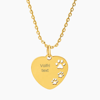 hjärtformat halsband guld med tassavtryck och gravyr.