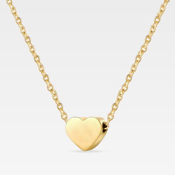 Halsband i guld färg med ett litet hjärta